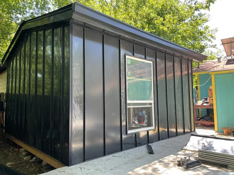 Black standing seam metal wall panels for Roof Inspection in Coconut Creek