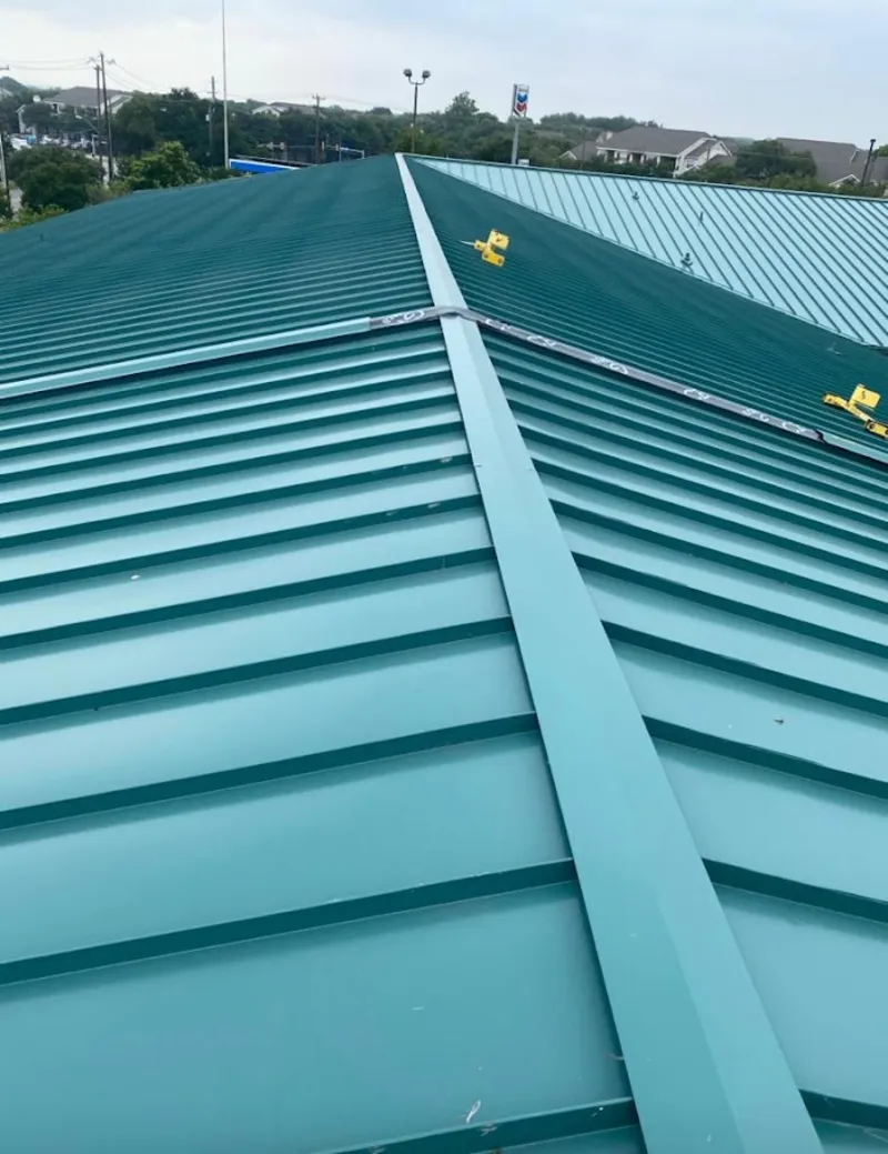 Green commercial metal roof ridge and valley for Metal Roof Repair in Coconut Creek